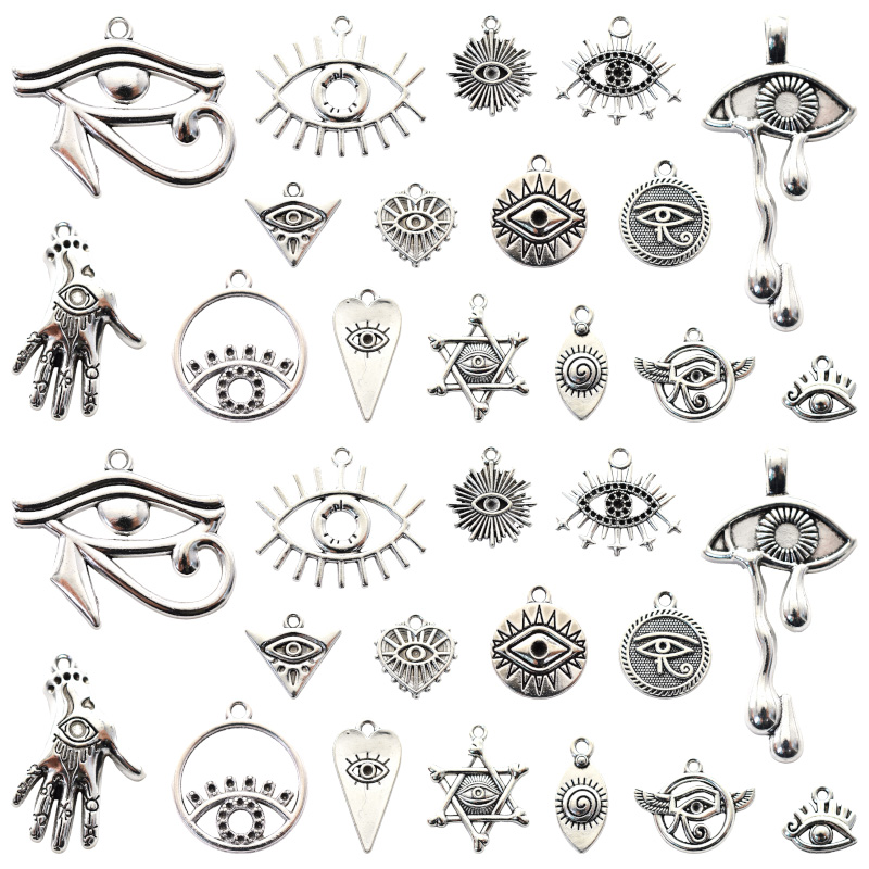 Vintage Fashion Nz - 16 buah liontin ajaib Tibet logam